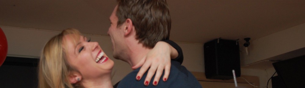 Happy Man and Beautiful Woman Dancing playing with meds hug and smile